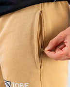 Tobe Hose Studio Herrenhose in Beige mit praktischer Seitentasche mit Reißverschluss aus dickem Baumwollstoff