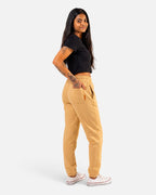 Tobe Hose Studio Jogginghose in Beige mit weichem Innenfutter, Reißverschlusstaschen und Hyänen-Logo-Stick