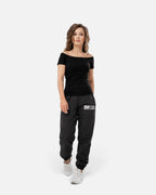 Tobe Hose Studio Damen-Hose Luft in Schwarz aus robustem Nylon mit gesticktem Logo und Reißverschlusstaschen