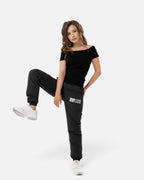 Tobe Hose Studio Damen Hose Luft in Schwarz aus robustem Nylon mit gesticktem Hyänen-Logo und Reißverschlusstaschen