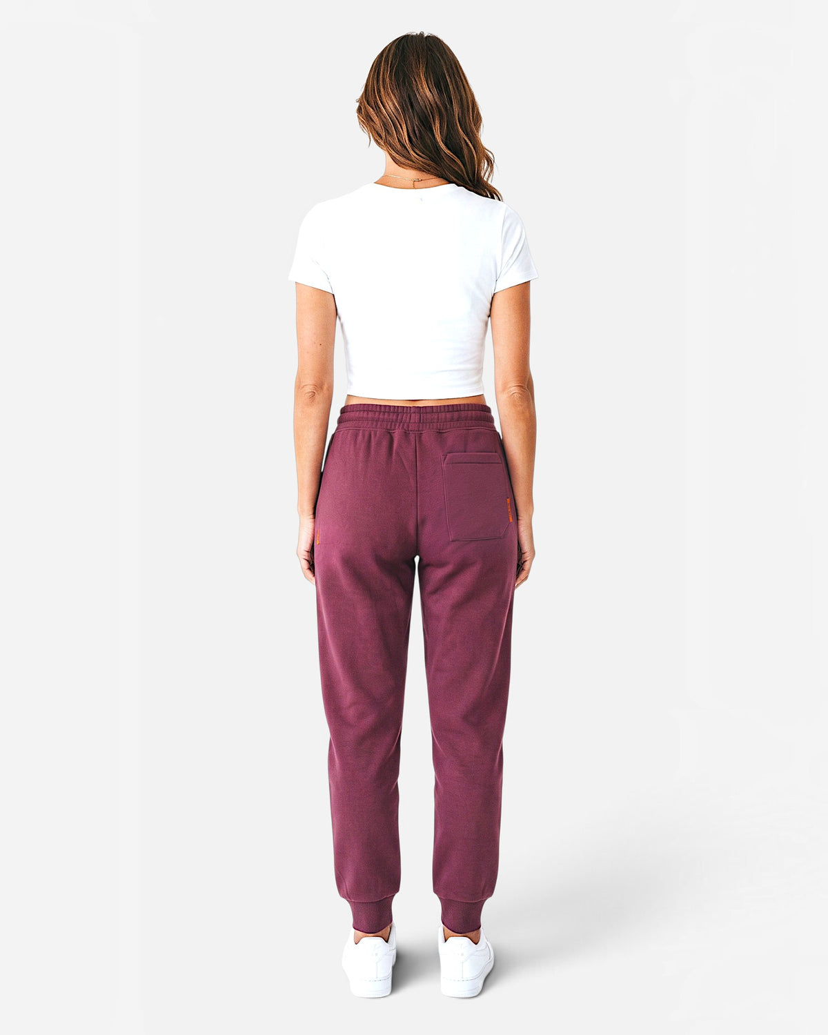 Tobe Hose Studio Damen-Jogginghose in Pflaume mit elastischem Bund, Gesäßtasche und Hyänen-Logo-Stickerei