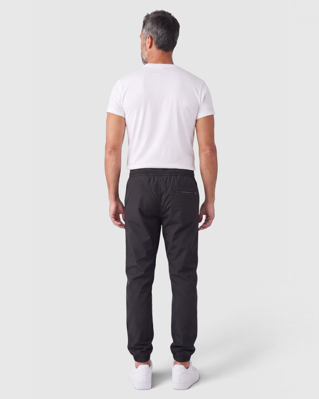 Tobe Hose Studio Herrenhose Luft in Schwarz aus robustem Nylon mit Reißverschlusstasche hinten, Rückansicht