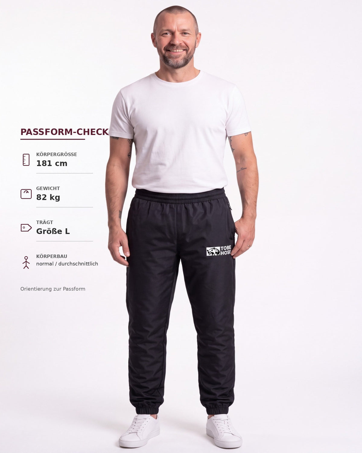 Tobe Hose Studio Herrenhose Luft in Schwarz aus robustem Nylon mit gesticktem Hyänen-Logo und Reißverschlusstaschen