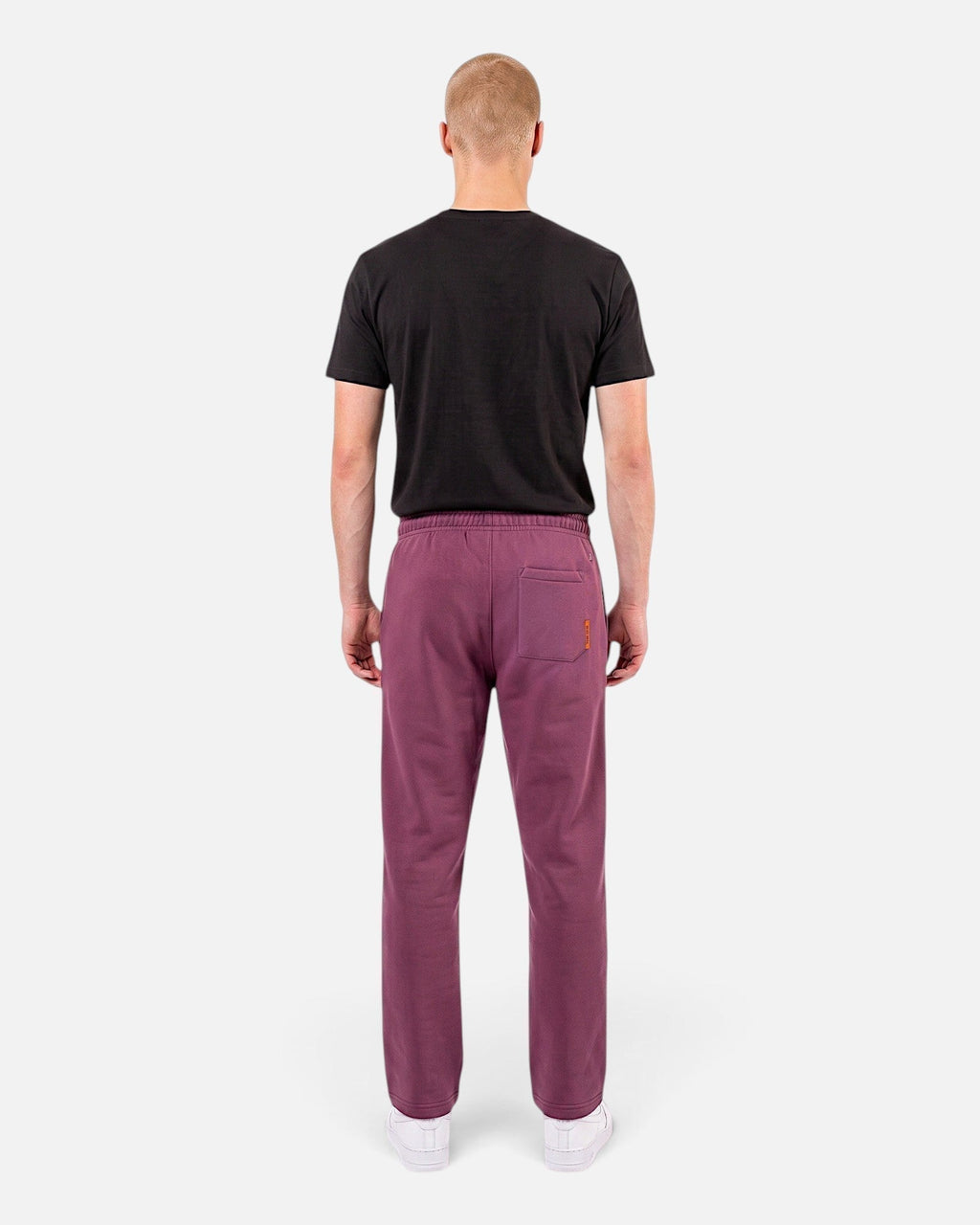 Tobe Hose Studio Herrenhose in Pflaume mit Gesäßtasche und Hyänen-Logo-Stickerei, Rückansicht
