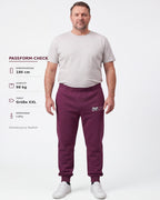 Tobe Hose Studio Herrenhose in Pflaume mit elastischem Bund, Reißverschlusstaschen und Hyänen-Logo-Stickerei