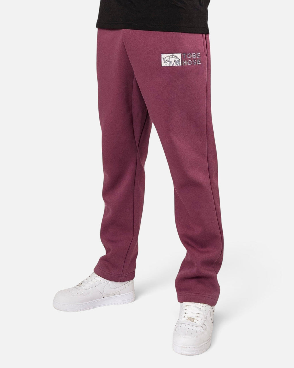 Tobe Hose Studio Herrenhose in Pflaume mit Hyänen-Logo Stickerei und geradem Beinabschluss ohne Bündchen