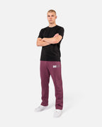 Tobe Hose Studio Herrenhose in Pflaume mit Hyänen-Logo, geradem Schnitt und Reißverschlusstaschen
