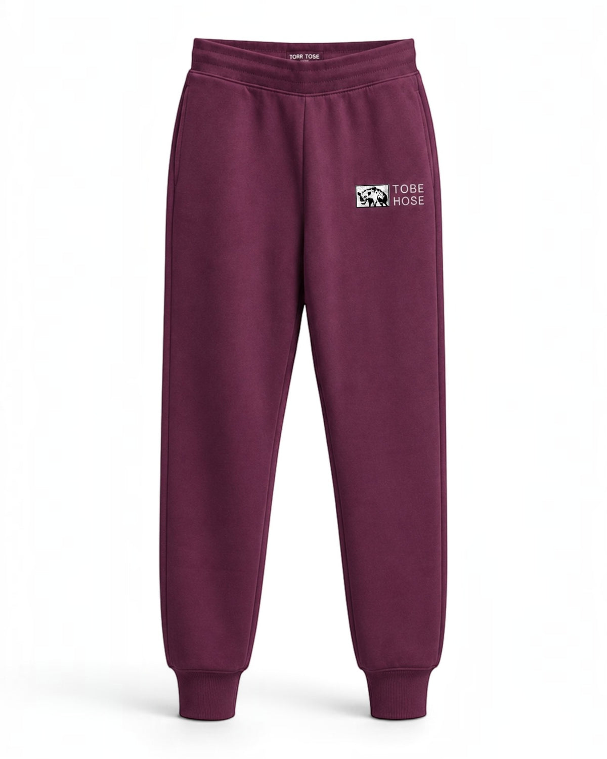 Tobe Hose Studio Damen-Jogginghose in Pflaume mit elastischem Bund, Reißverschlusstaschen und Hyänen-Logostickerei
