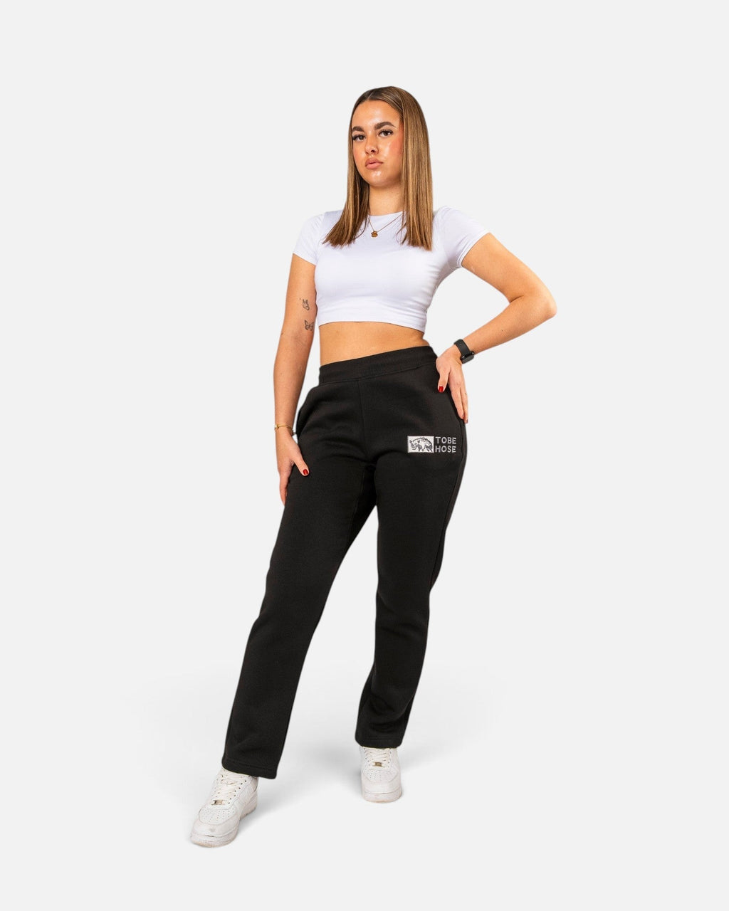 Tobe Hose Studio Damen-Jogginghose in Schwarz mit Hyänen-Logo-Stickerei, Seitentaschen und weichem Innenfutter