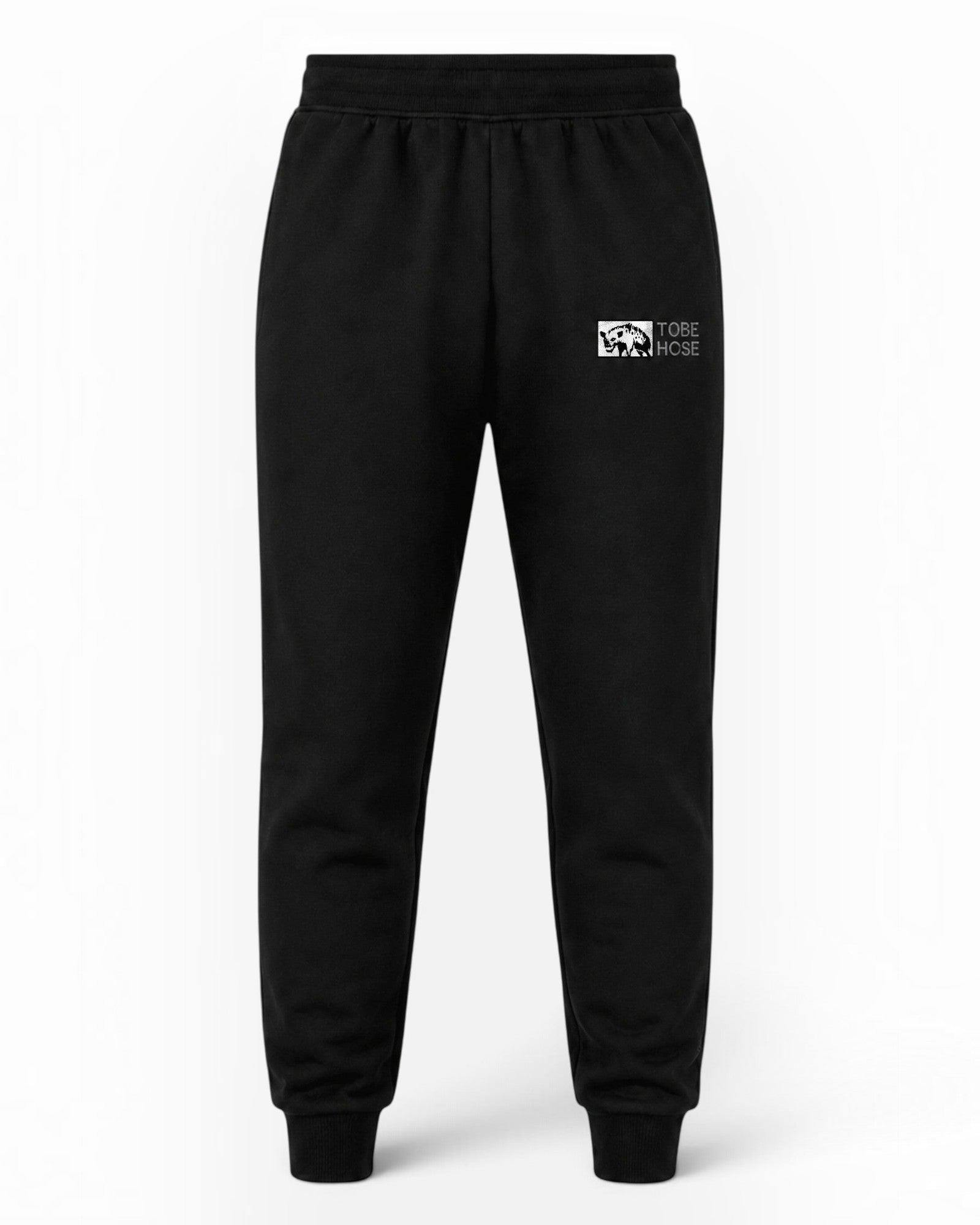 Tobe Hose Studio Herren-Jogginghose in Schwarz mit weichem Innenfutter, Reißverschlusstaschen und Hyänen-Logo-Stick