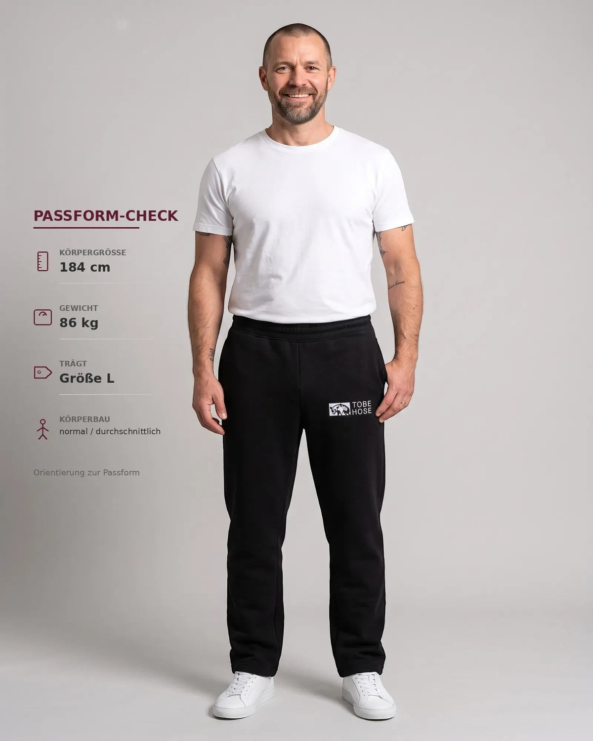 Tobe Hose Studio Herren-Jogginghose in Schwarz mit Hyänen-Logo, weichem Innenfutter und Reißverschlusstaschen