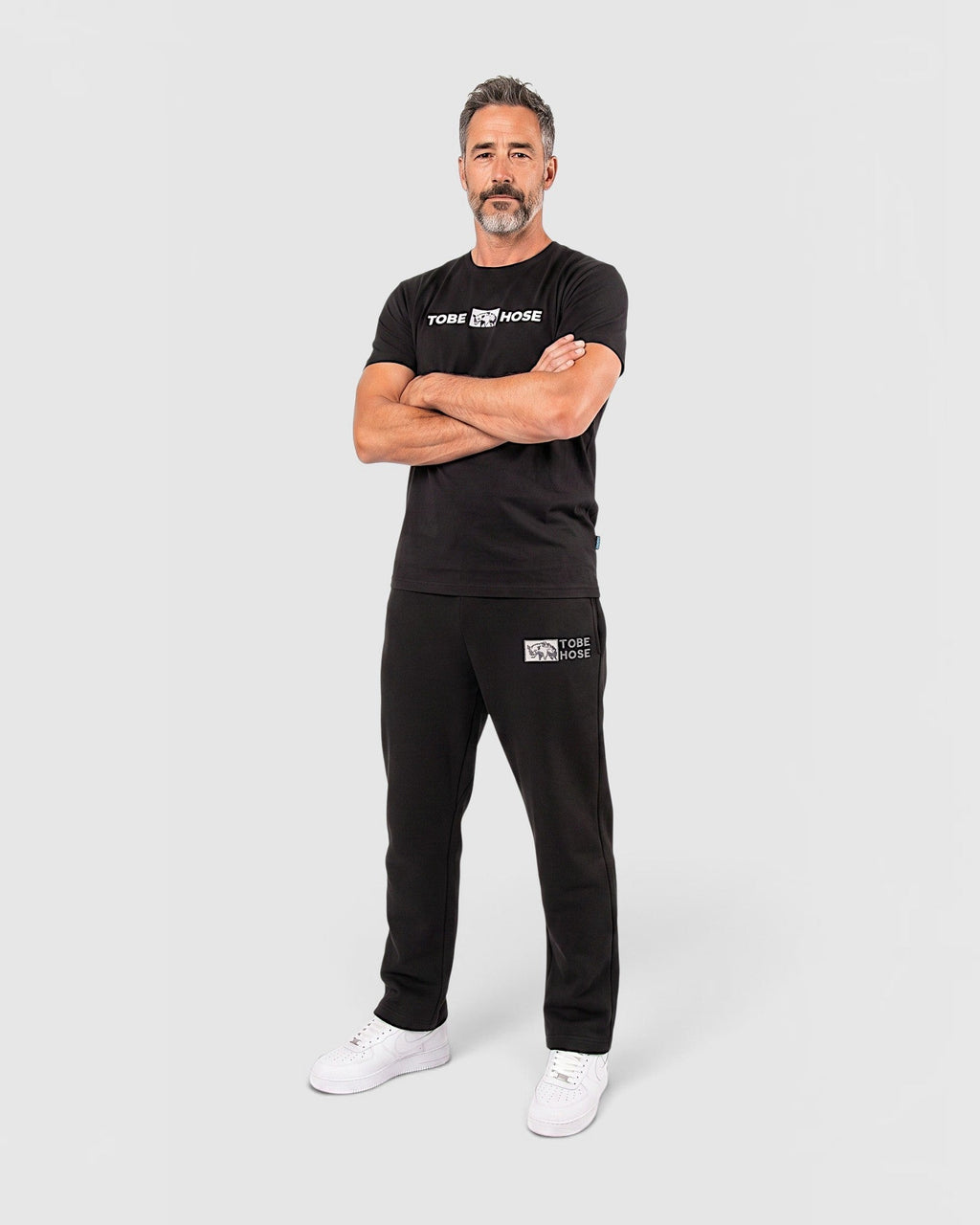 Tobe Hose Studio Herren-Jogginghose in Schwarz mit Hyänen-Logo-Stickerei und Seitentaschen mit Reißverschluss
