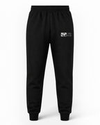 Tobe Hose Studio Herren-Jogginghose in Schwarz mit weichem Innenfutter, Reißverschlusstaschen und Hyänen-Logo-Stick