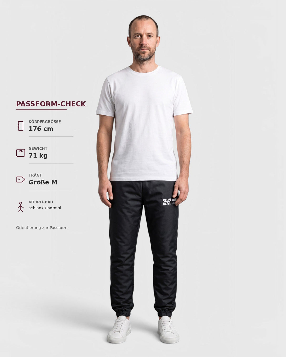 Tobe Hose Studio Herrenhose Luft in Schwarz aus robustem Nylon mit gesticktem Hyänen-Logo und Reißverschlusstaschen