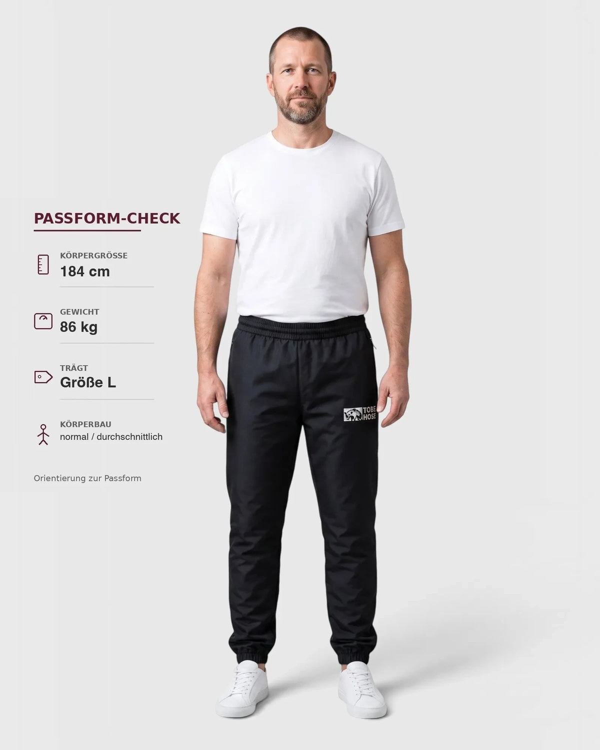 Tobe Hose Studio Herrenhose Luft in Schwarz aus robustem Nylon mit gesticktem Hyänen-Logo und Reißverschlusstaschen