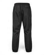 Rückansicht der schwarzen Tobe Hose Studio Luft Damen-Hose aus robustem Nylon mit Gesäßtasche und elastischem Bund