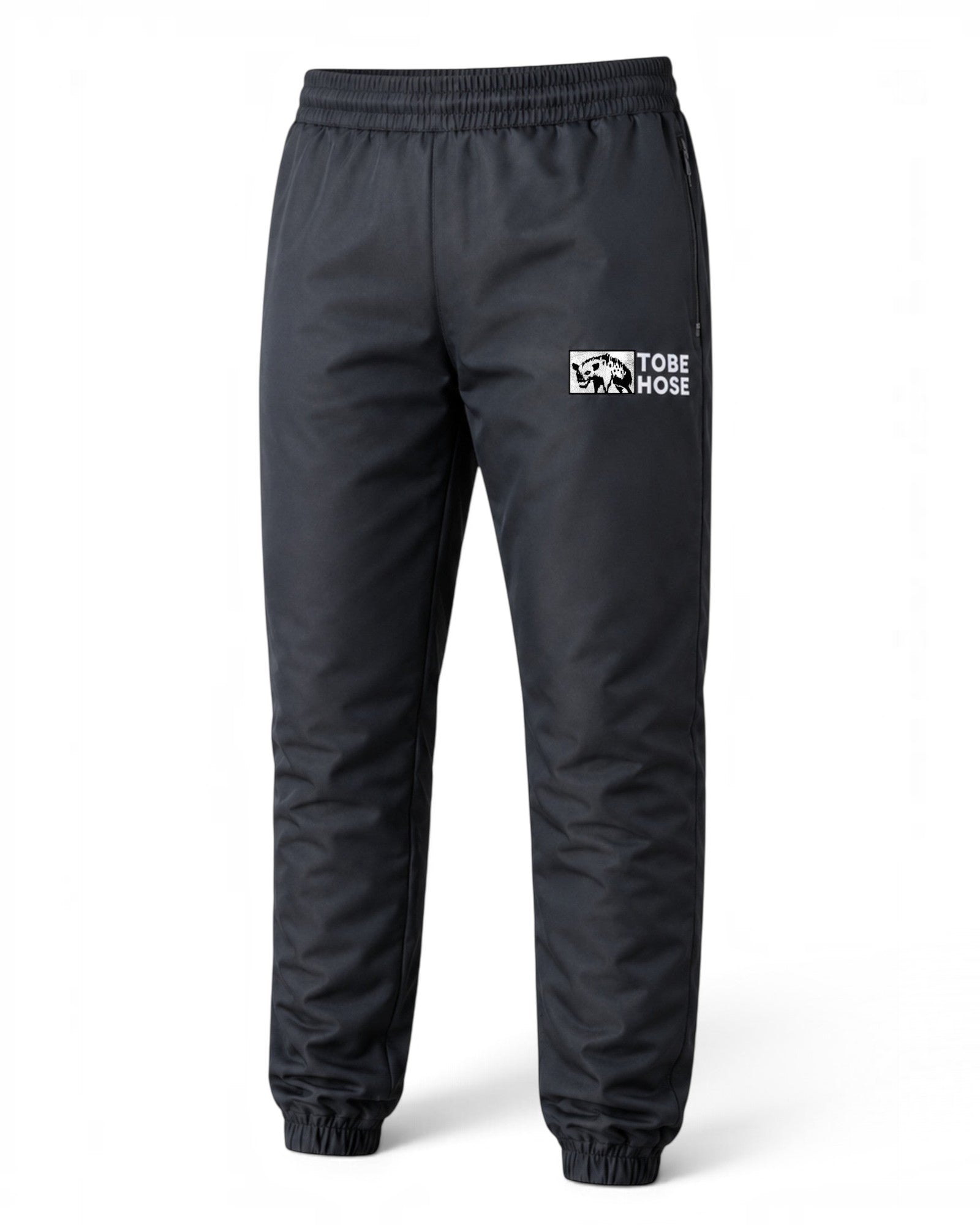 Schwarze Tobe Hose Studio Luft Trainingshose aus robustem Nylon mit gesticktem Hyänen-Logo und Reißverschlusstaschen