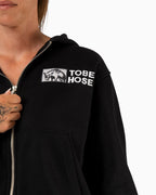 Tobe Hose Studio Zip-Hoodie Fels in Schwarz mit Hyänen-Stickerei und Reißverschluss auf der Brust